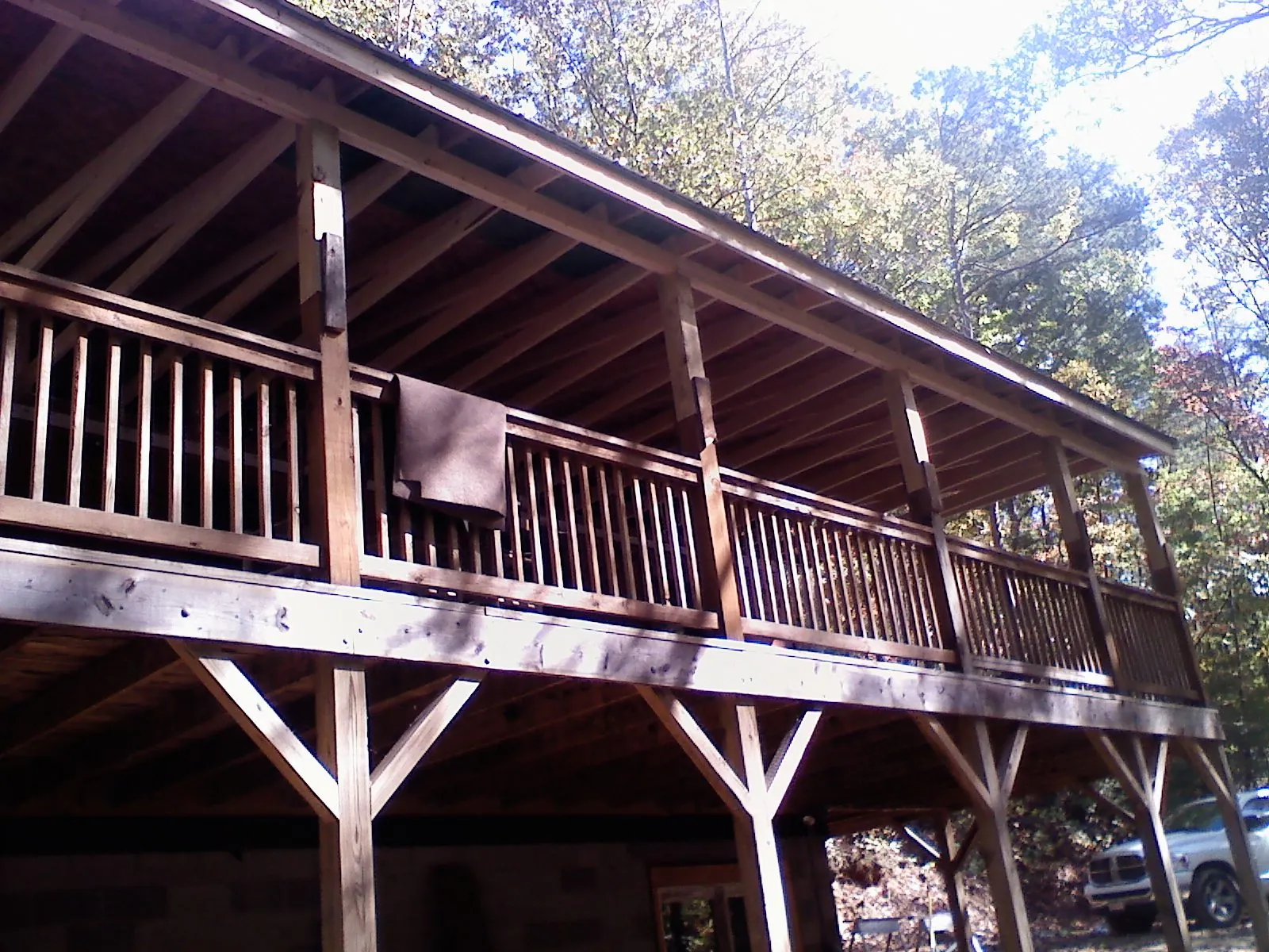 Timber framing under a new elevated porch and deck — Roof Leak Repair in Dufur by Roofing Brothers
